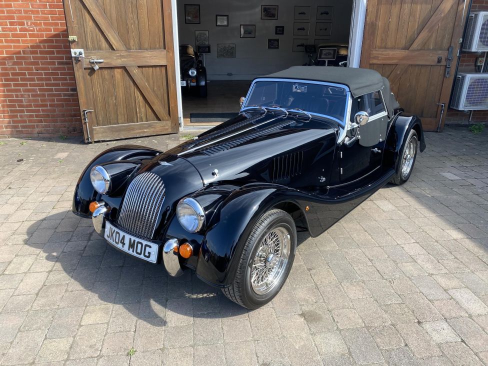 2016 Morgan plus 4 GDI in black. Photograph