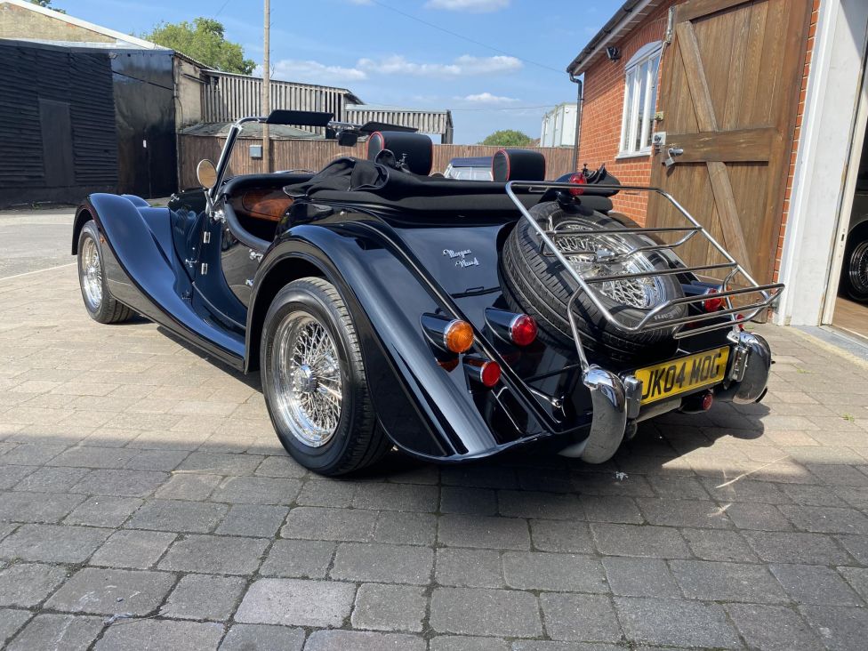 2016 Morgan plus 4 GDI in black. Photograph