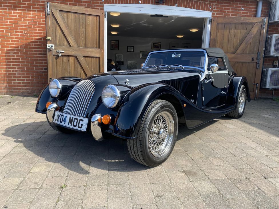 2016 Morgan plus 4 GDI in black. Photograph